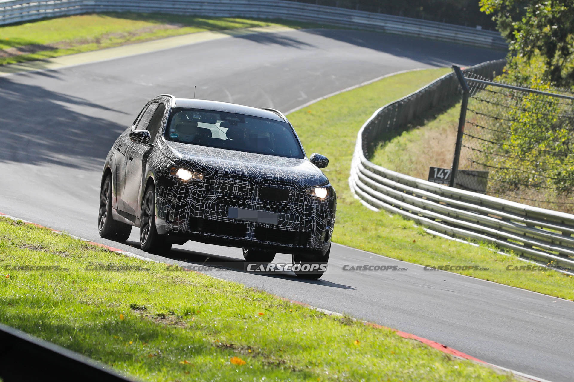 2024 BMW X3M Can’t Hide Its Big Grille Behind Disguise Carscoops