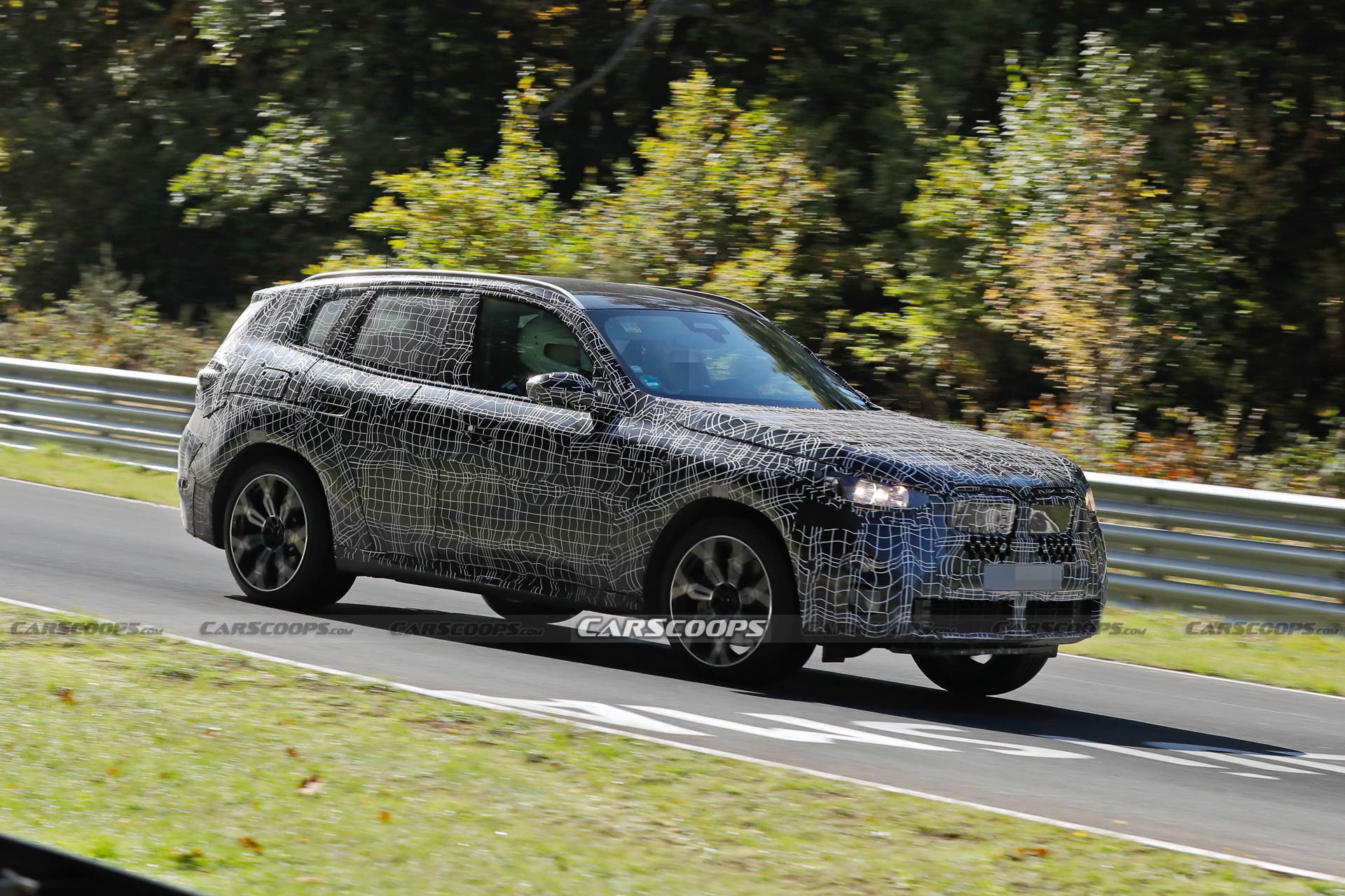 2024 BMW X3M Can’t Hide Its Big Grille Behind Disguise Carscoops