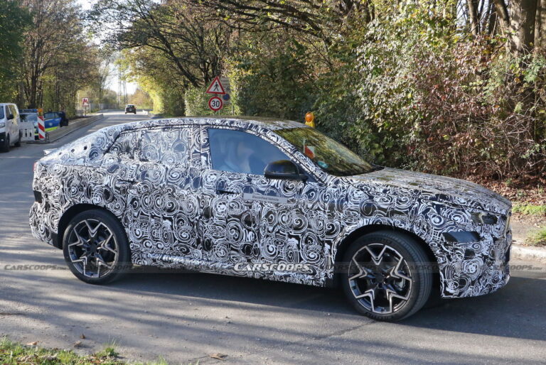 2024 BMW iX2 EV Spied With A Covered Grille And Sloping Roofline ...