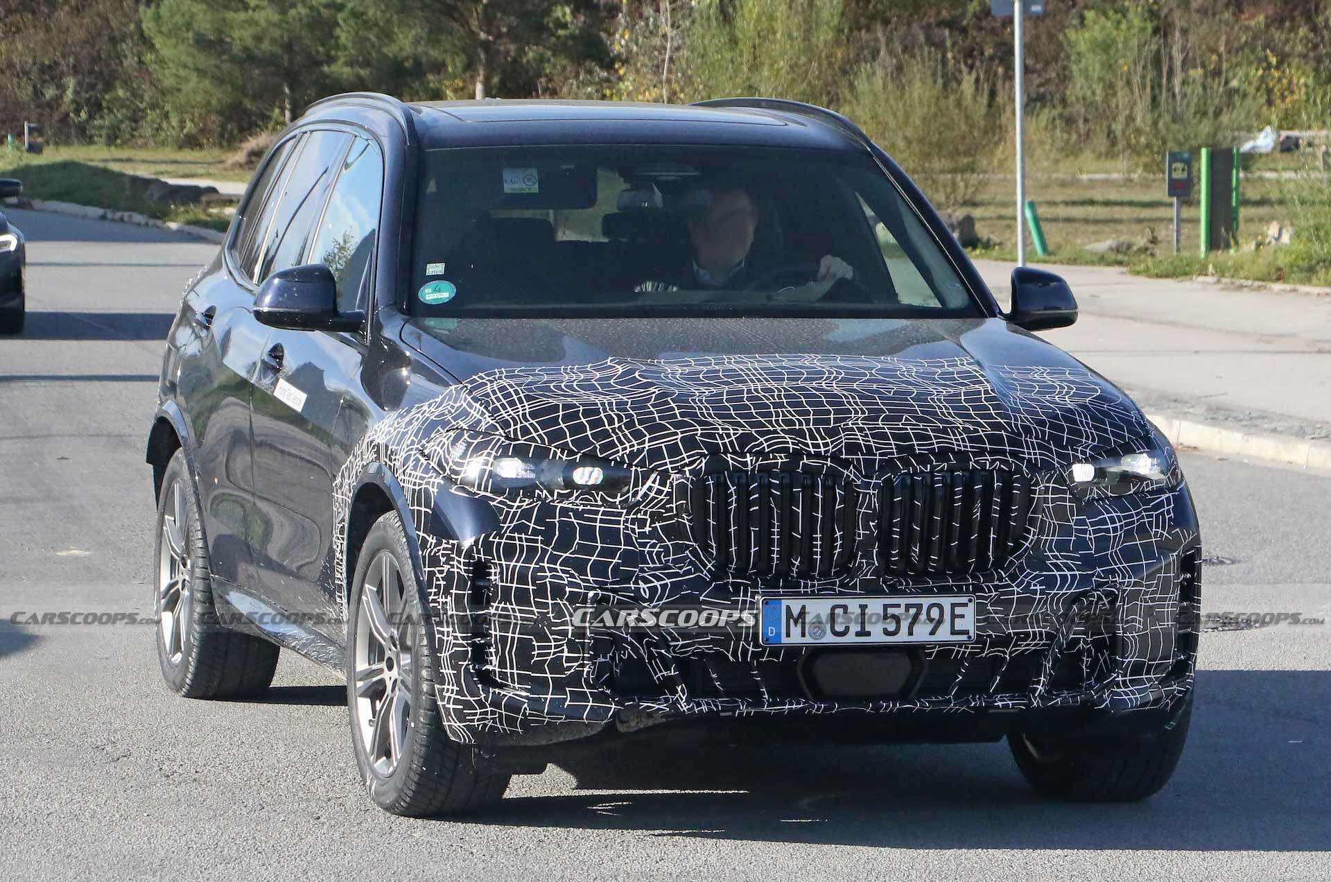 Facelifted 2024 BMW X5 Hybrid Must Be Feeling The Cold, Puts Disguise