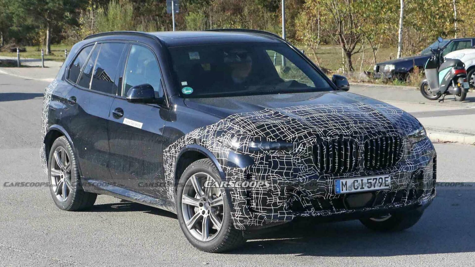 Facelifted 2024 BMW X5 Hybrid Must Be Feeling The Cold, Puts Disguise ...