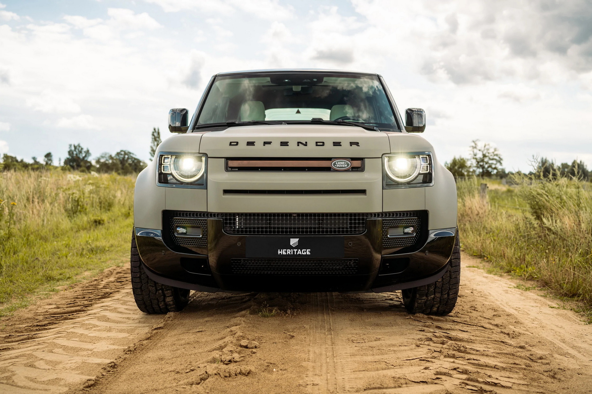 Land Rover Defender Looks Retrotastic With Rock Dust Wheels By Heritage ...