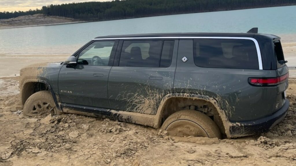  Rivian R1S Abandoned On Lake Shore After It Got Stuck And Froze In The Mud