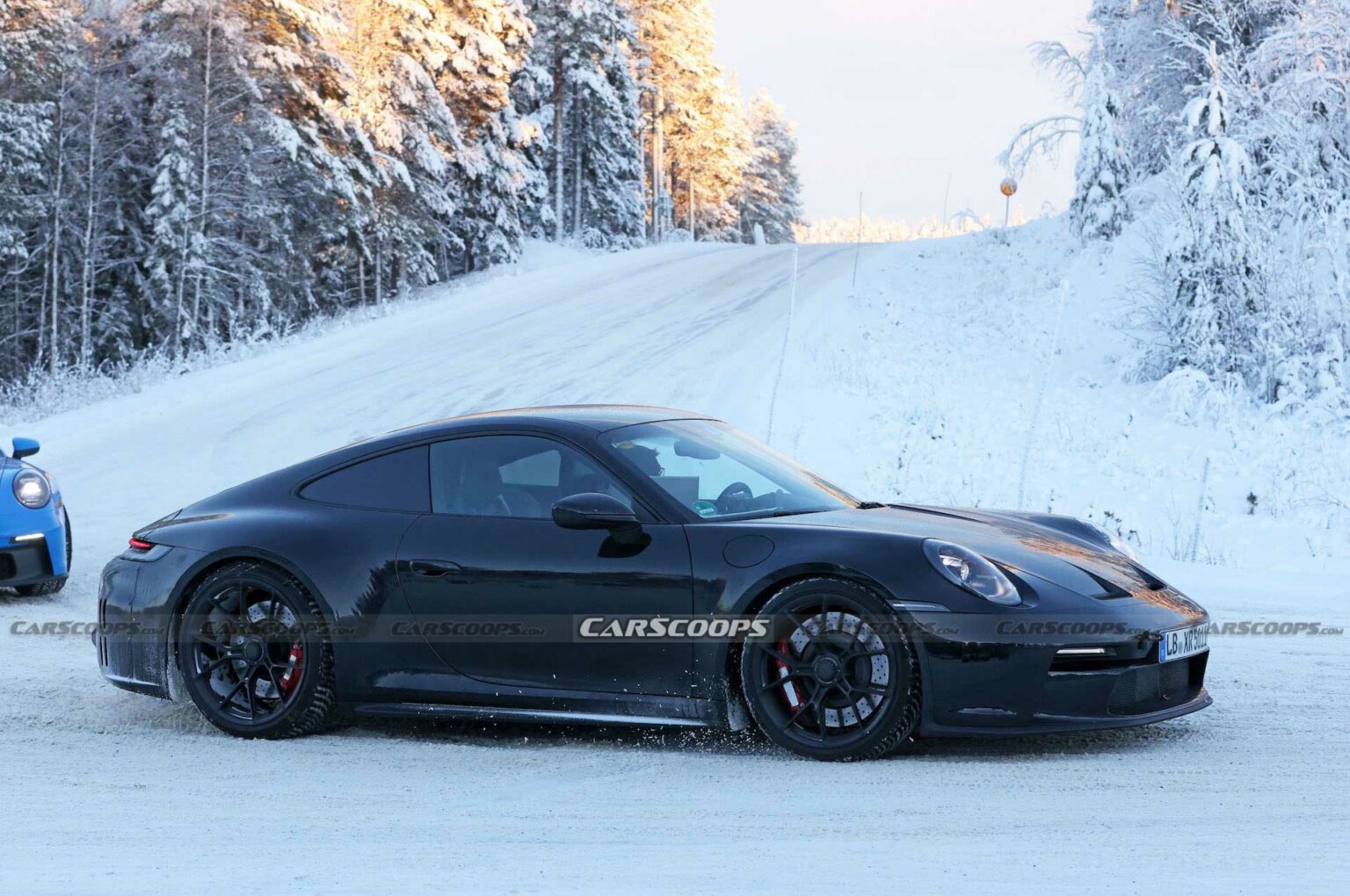 Facelifted 2024 Porsche 911 GT3, Touring And New ST Spotted Holding