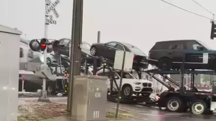  Watch Train Smash Through Beached Car Hauler Loaded With Luxury Vehicles In Florida