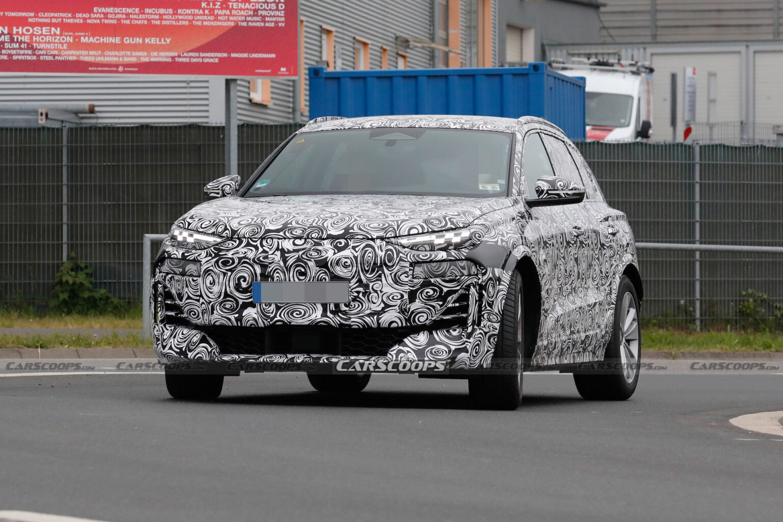 Audi Q6 E-tron Spied With More Agressive Bumper And Fender Vents, Is It ...