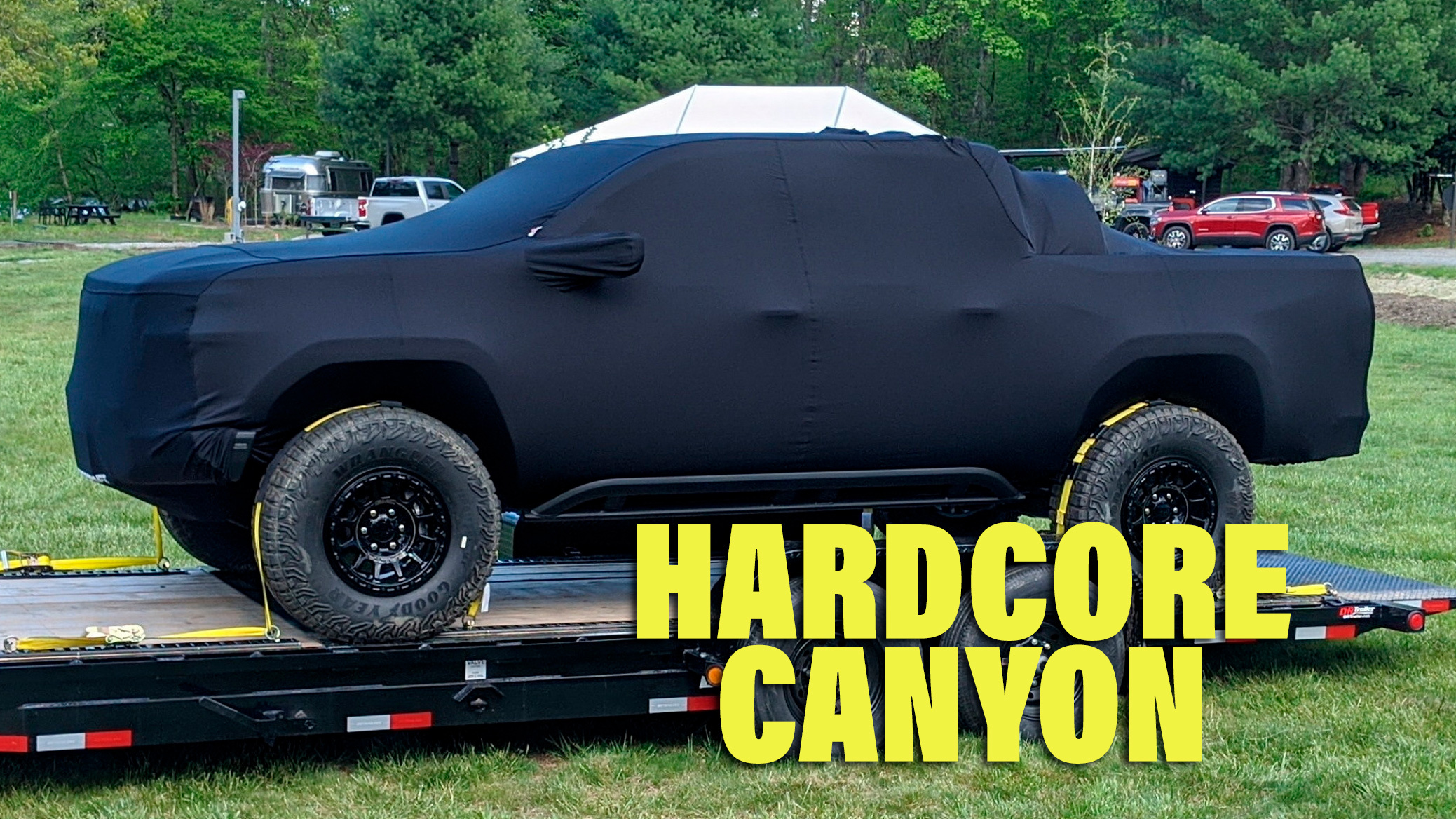 Gmc Teases New Extreme Canyon At X Aev Edition Behind Cloak Carscoops