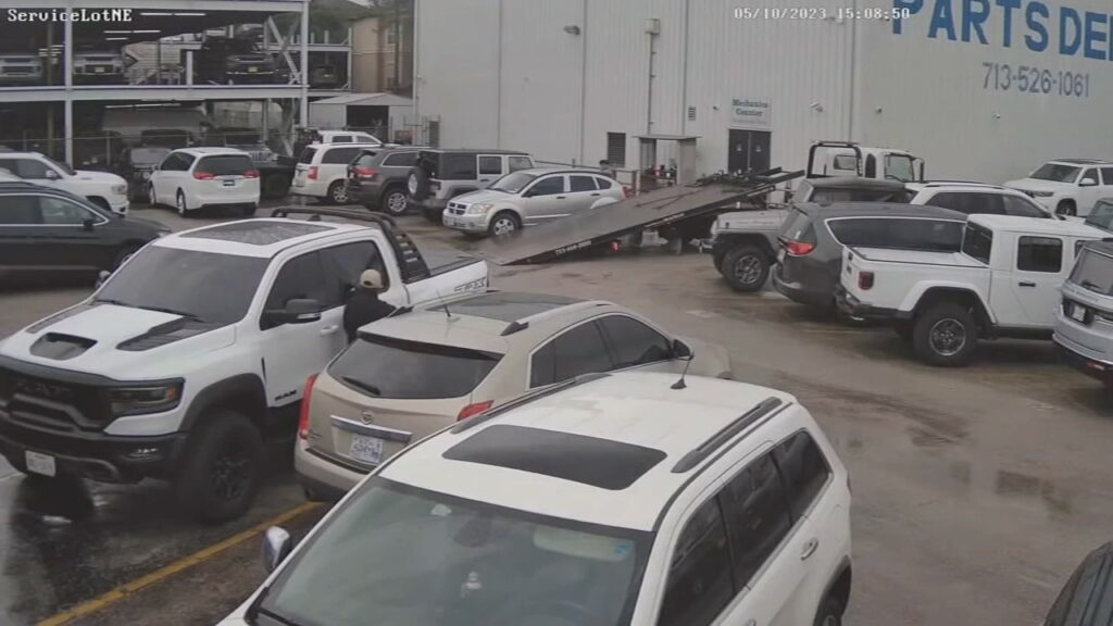  Watch Brazen Thieves In Stolen Cadillac Steal RAM TRX From Dealer During Business Hours