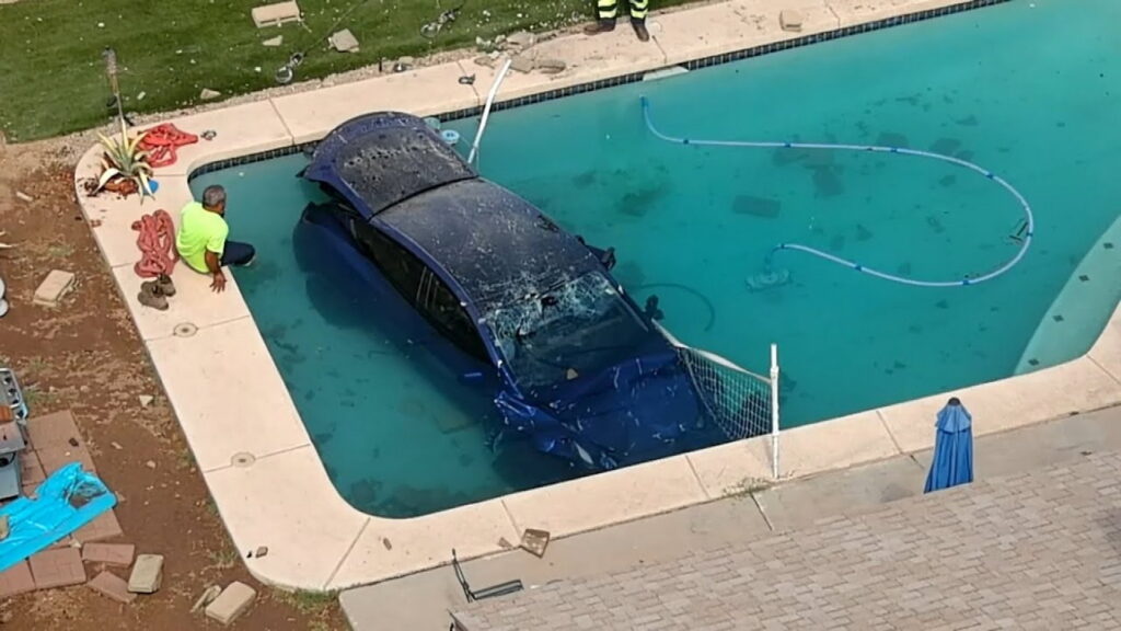  Tesla Bashes Through Wall And Plunges Into House Pool