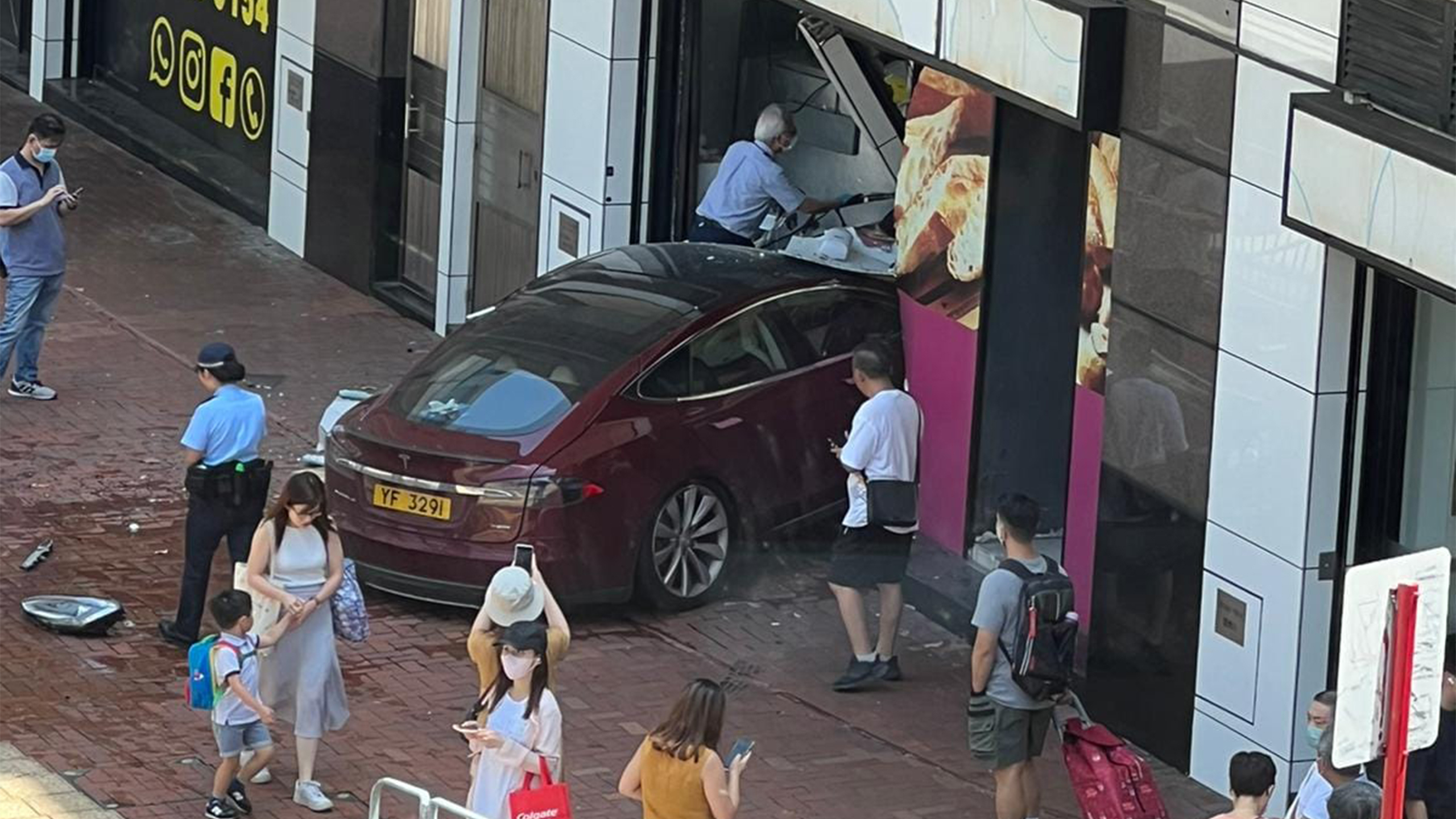 Tesla Model S Slams Into Bakery Storefront In Hong Kong, Injuring 