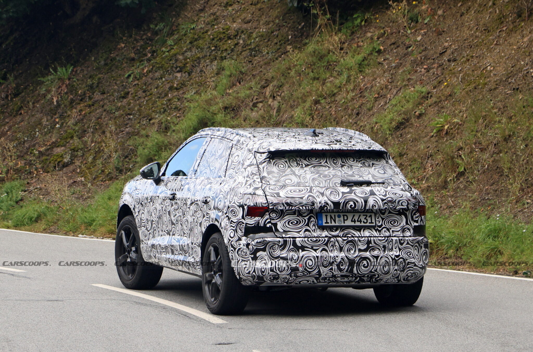 2025 Audi Q3 Spied Looking Like A Baby Q6 E-Tron With ICE Power | Carscoops