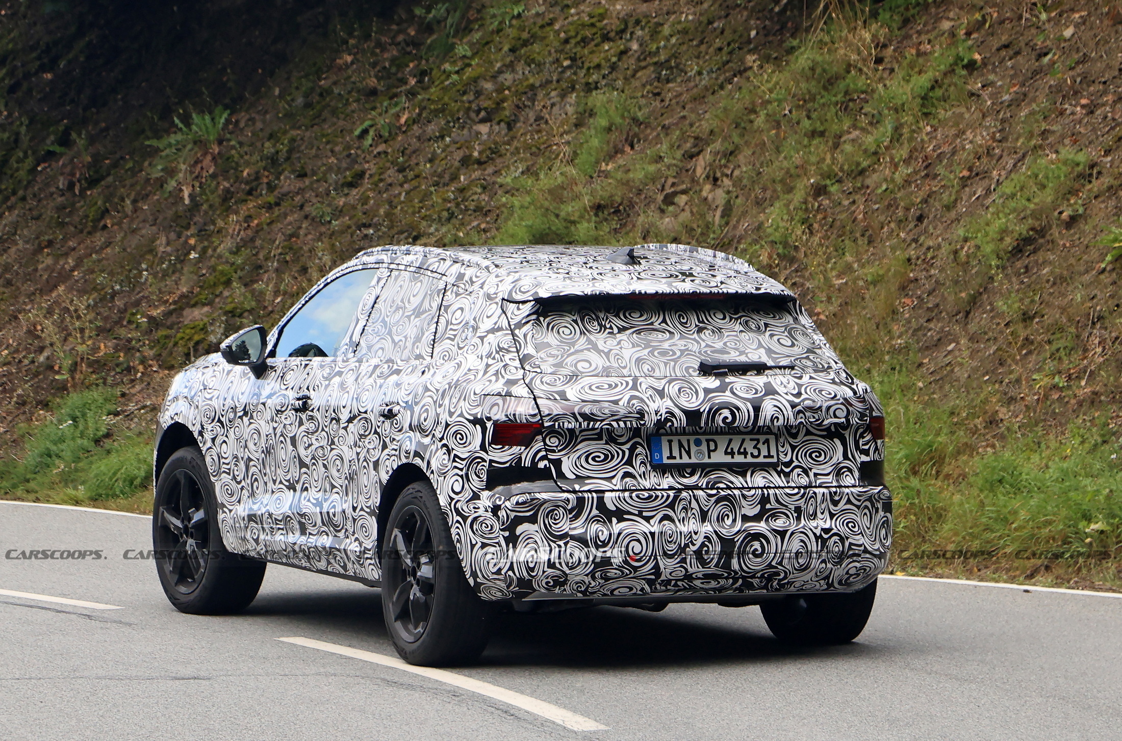 2025 Audi Q3 Spied Looking Like A Baby Q6 E-Tron With ICE Power | Carscoops