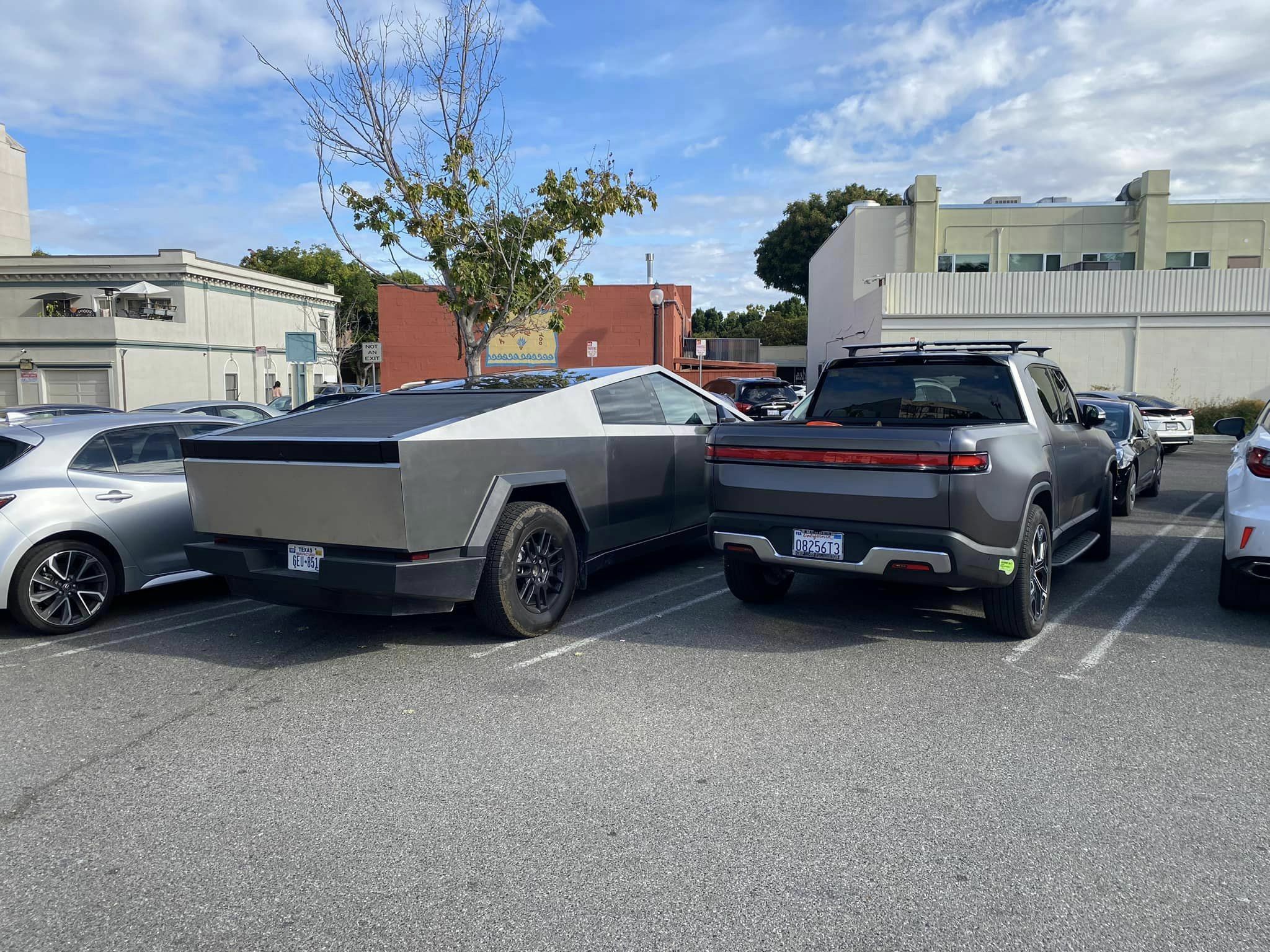 Rivian R1T Lines Up Alongside Tesla Cybertruck, Which Would You Choose ...