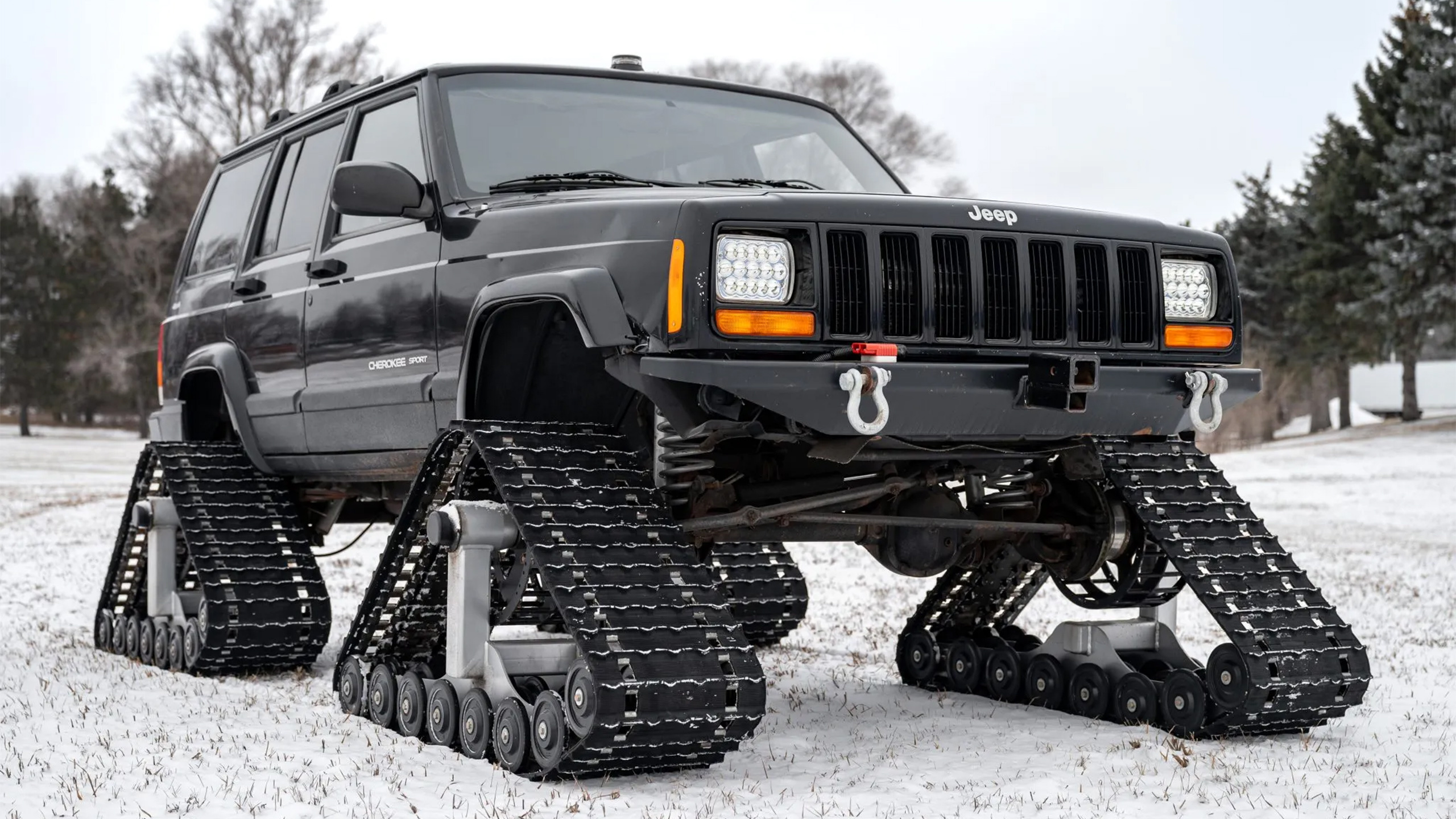 Snow Plows? Nah, This Tracked Jeep Cherokee Eats Blizzards For