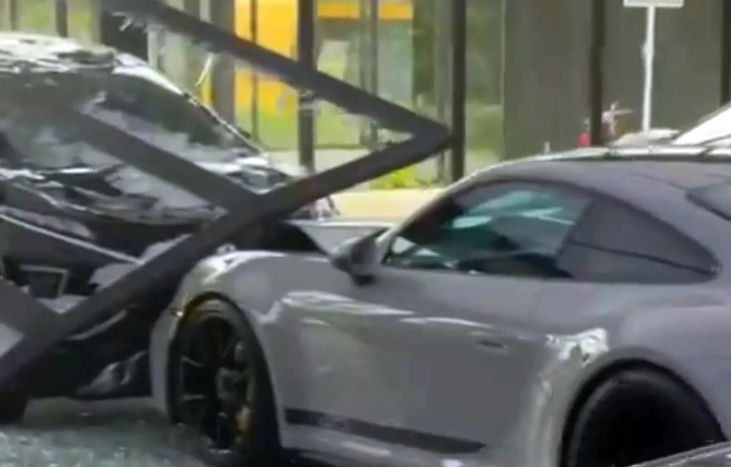  Runaway SUV Plows Into Luxury Car Dealer In Indonesia, Wrecks Porsche GT3