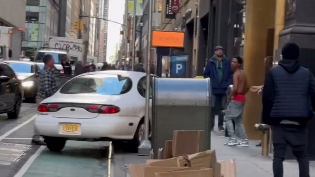  Ford Taurus Chases Pedestrian Onto Sidewalk In Wild NYC Road Rage Incident