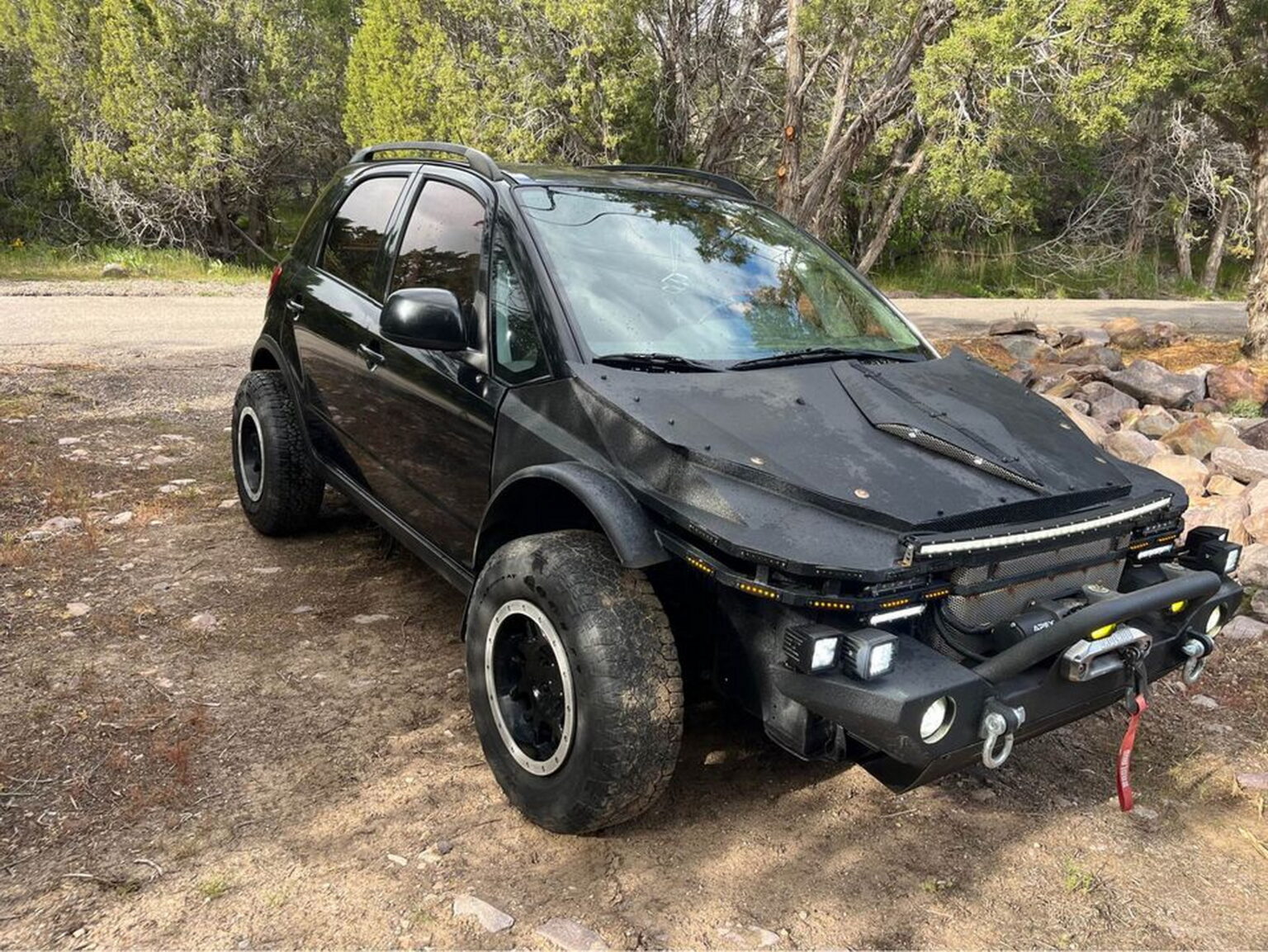 Wrecked Suzuki SX4 Reborn As A Mad Max Ready Battle Car | Carscoops