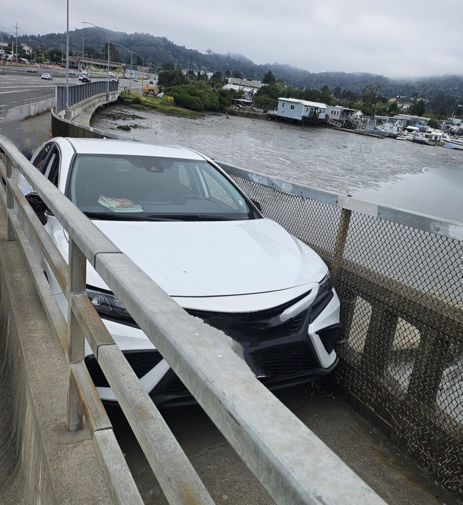  Man Gets Toyota Camry Stuck On Pedestrian Bridge After Driving Through It