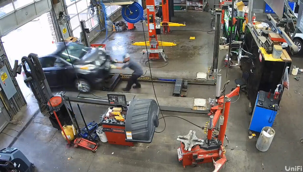     Mechanic crushed by Scion xD in his own garage