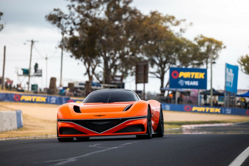  Jacky Ickx Drives Two Wild Genesis Concepts Around Australia’s Most Iconic Track