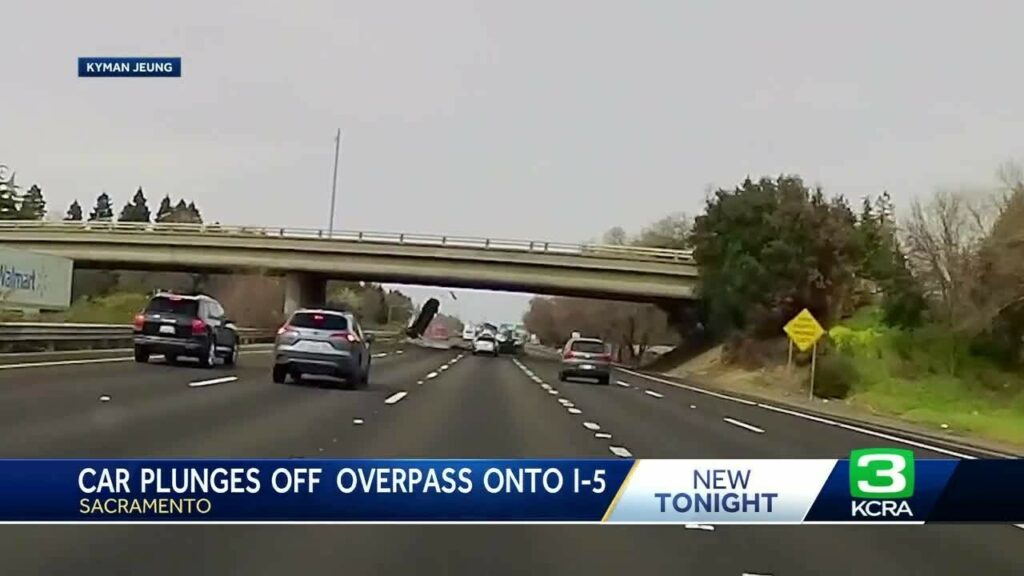  Car Falls From Overpass Onto Highway, Driver Miraculously Survives