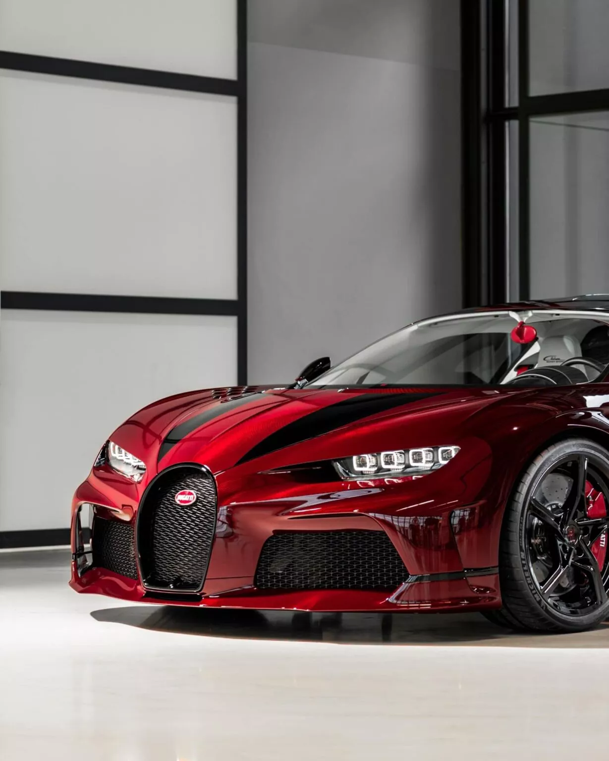 https://www.carscoops.com/wp-content/uploads/webp/2024/01/Bugatti-Chiron-Super-Sport-2-1229x1536.webp